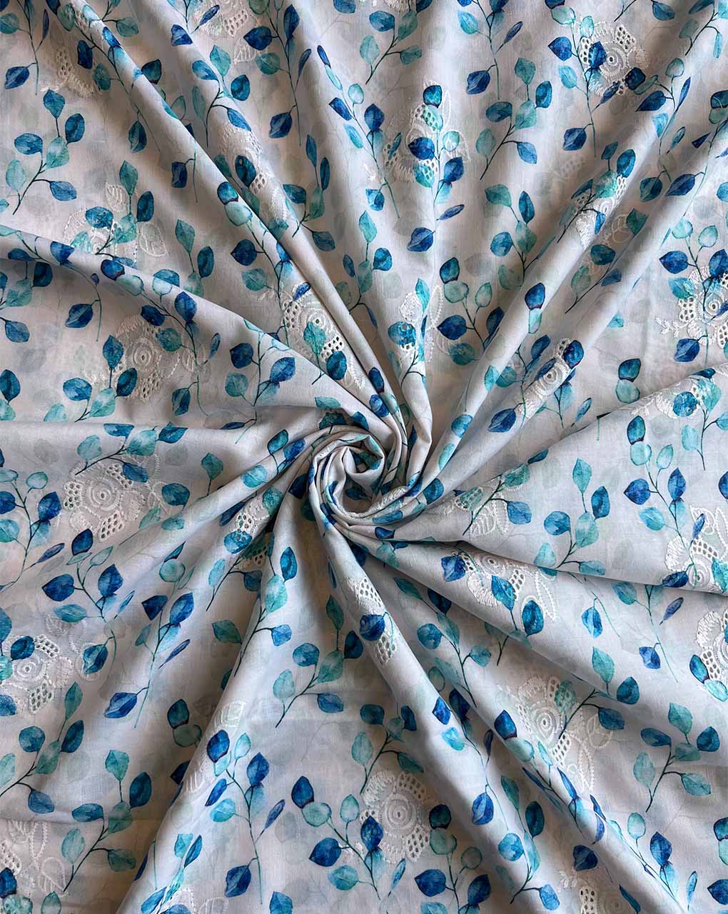 White Cotton Embroidered Fabric with Blue Leaf Print