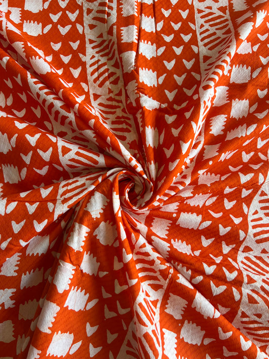 Orange Geometrical Printed Self Weaved Cotton Fabric