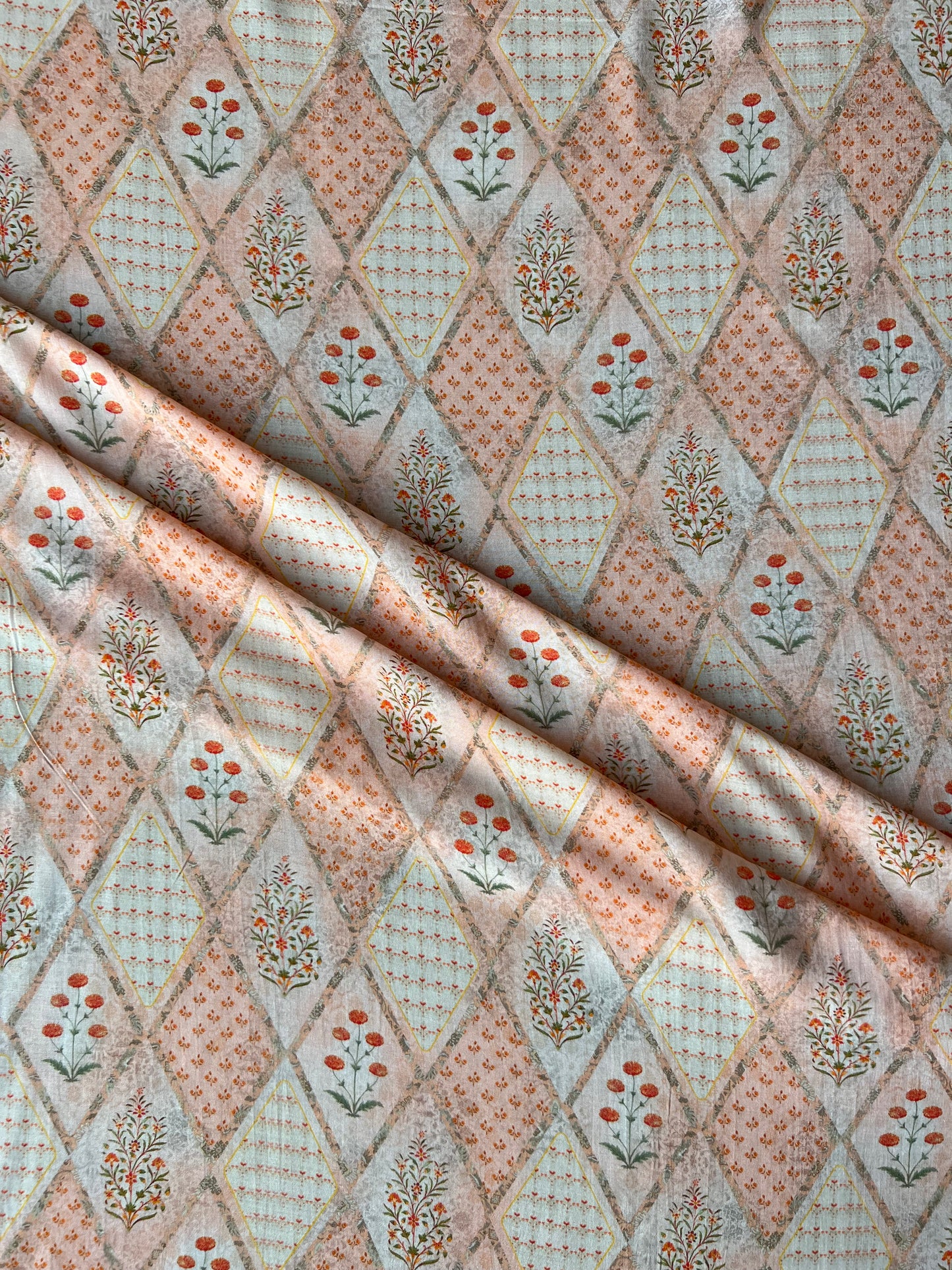 Peach Buti Jaal Print Muslin Fabric