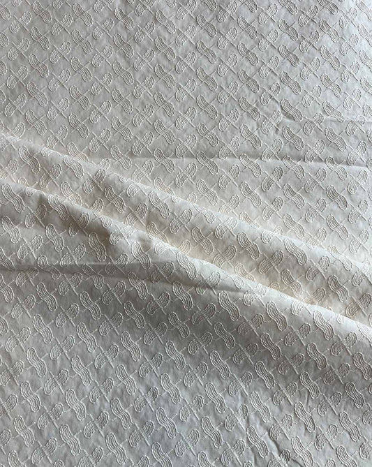 Cream Self Embroidered Cotton Fabric
