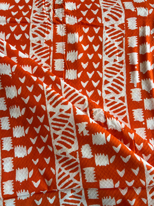Orange Geometrical Printed Self Weaved Cotton Fabric