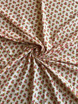 Peach Floral Printed Muslin Fabric